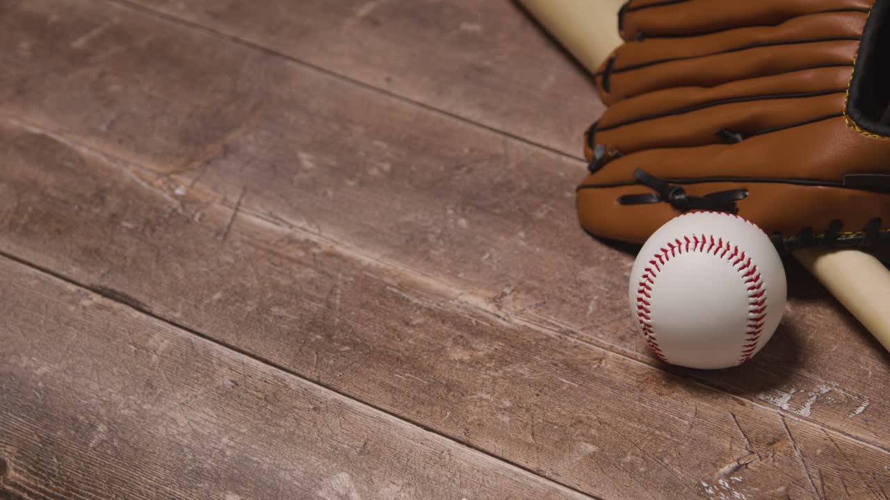 Free stock video Close up studio baseball still life with wooden bat
